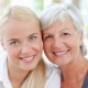 Lovely woman with her mother at home