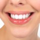 Happy young woman face with healthy white teeth. Dental health